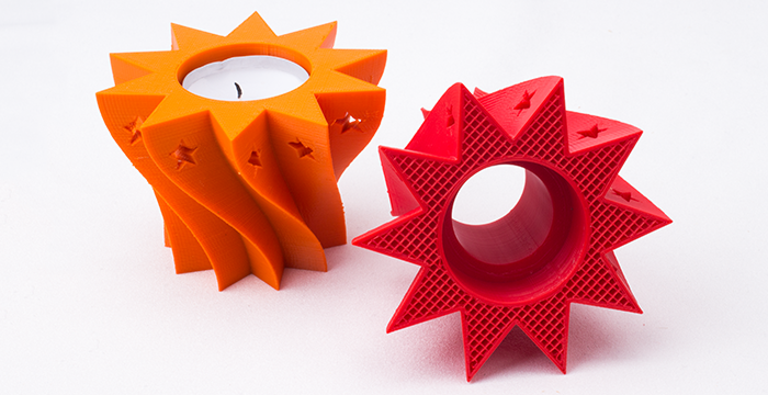 orangene Kerzenhalter liegend