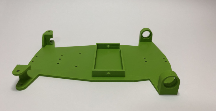 Karosserie in der Farbe grün.