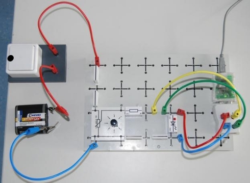 Versuchsaufbau I a) b)