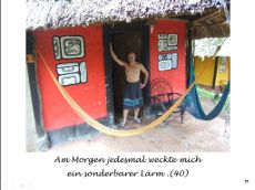 Mensch morgens vor buntem Haus